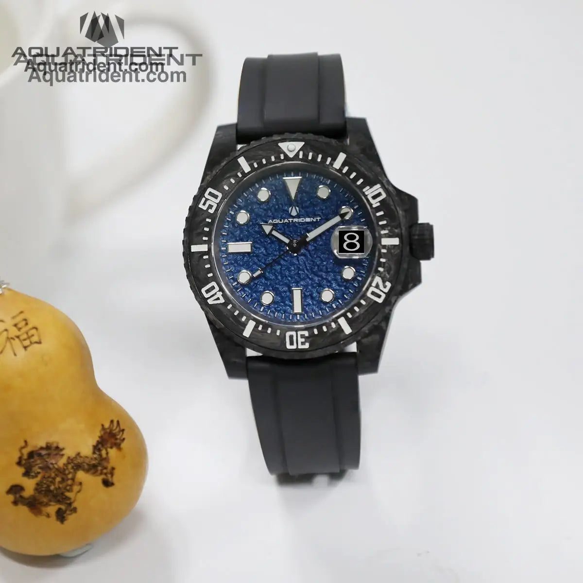 black carbon fiber case and bezel-Blue rough textured dial with dates-balck fluororubber-watch display